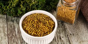 Mustard spicy sauce with seeds in the bowl