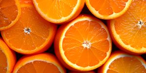 Realistic orange texture. Orange circles close up, tropical pattern, fruit banner AI generated image
