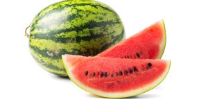 sliced fresh red watermelon isolated on white background
